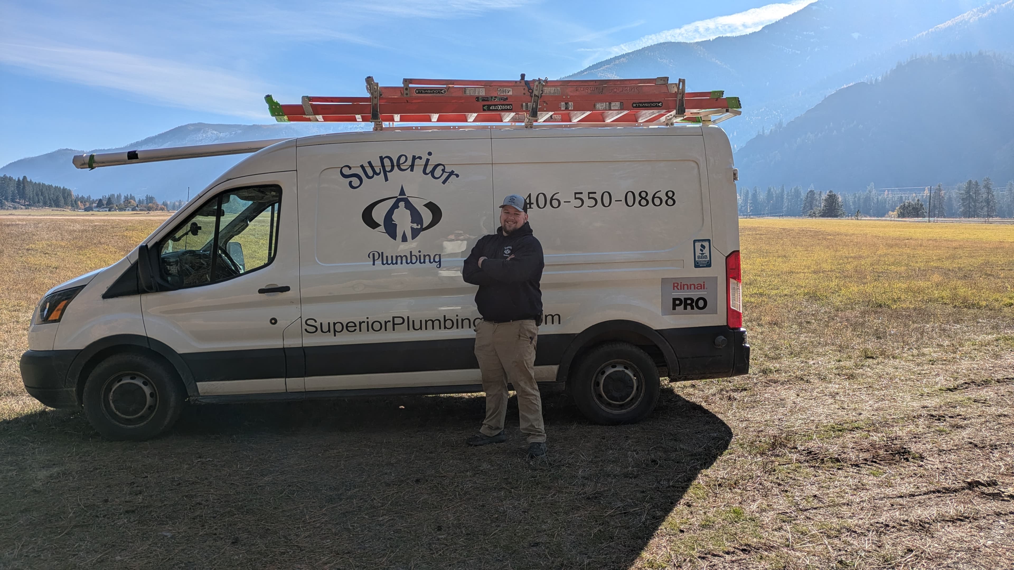 Company owner Brody Barr standing in front of a company truck